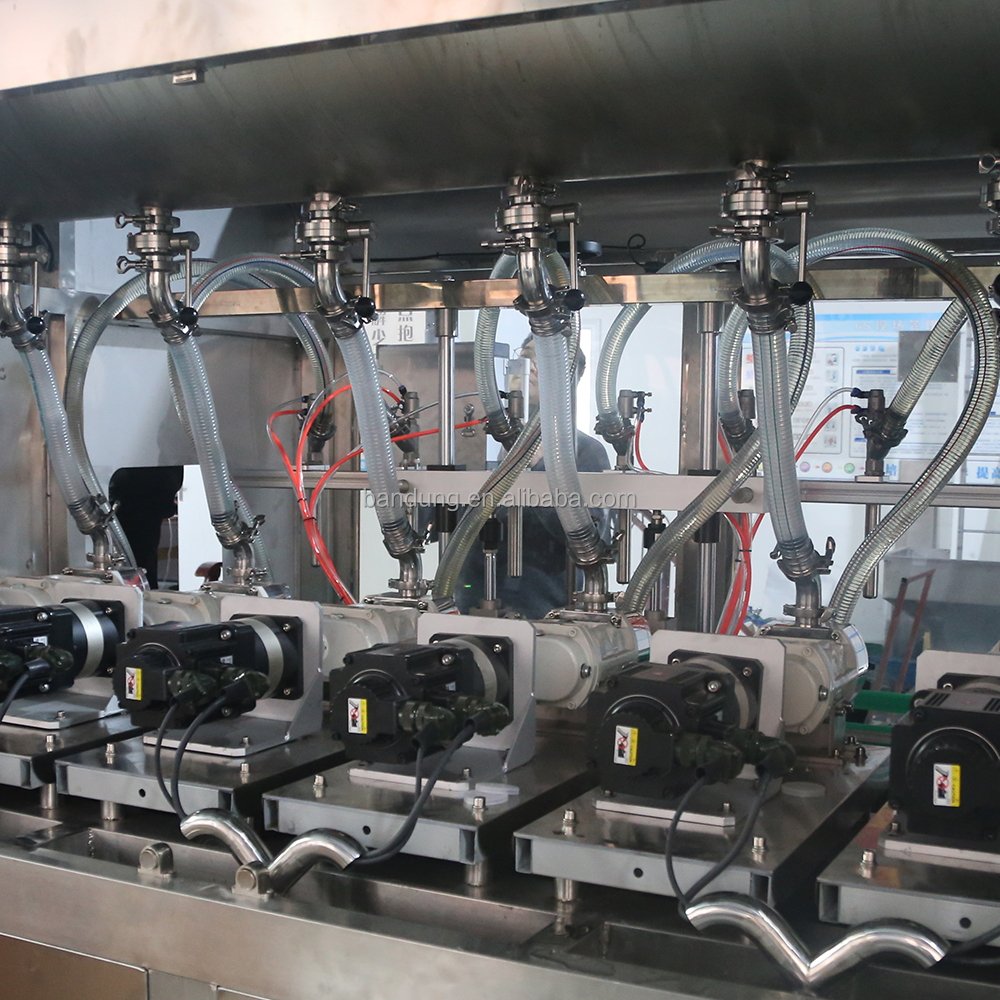 Automatic Glass Bottle Jar Can Rotor Pump Chunk Chili Sauce Meat Paste Sauce Filling Machine With Heating Mixing Stirrer Tank