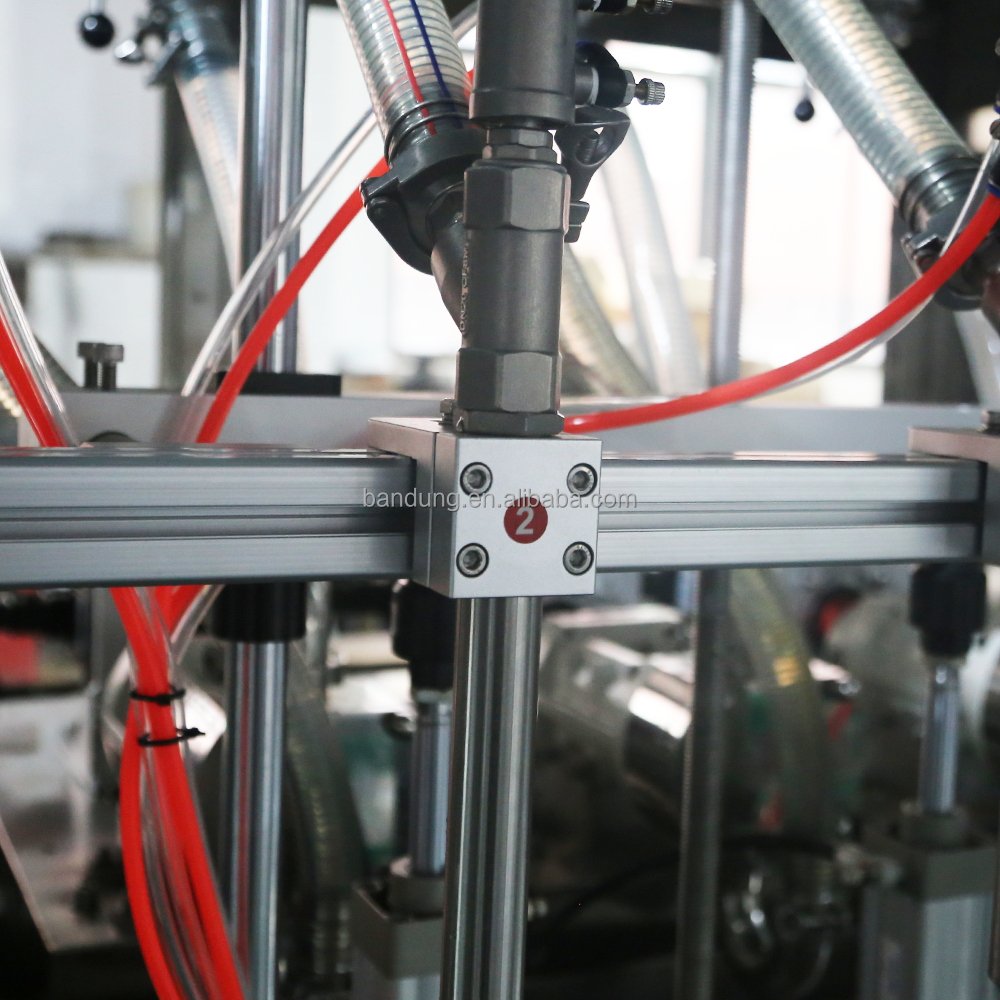 Automatic Glass Bottle Jar Can Rotor Pump Chunk Chili Sauce Meat Paste Sauce Filling Machine With Heating Mixing Stirrer Tank