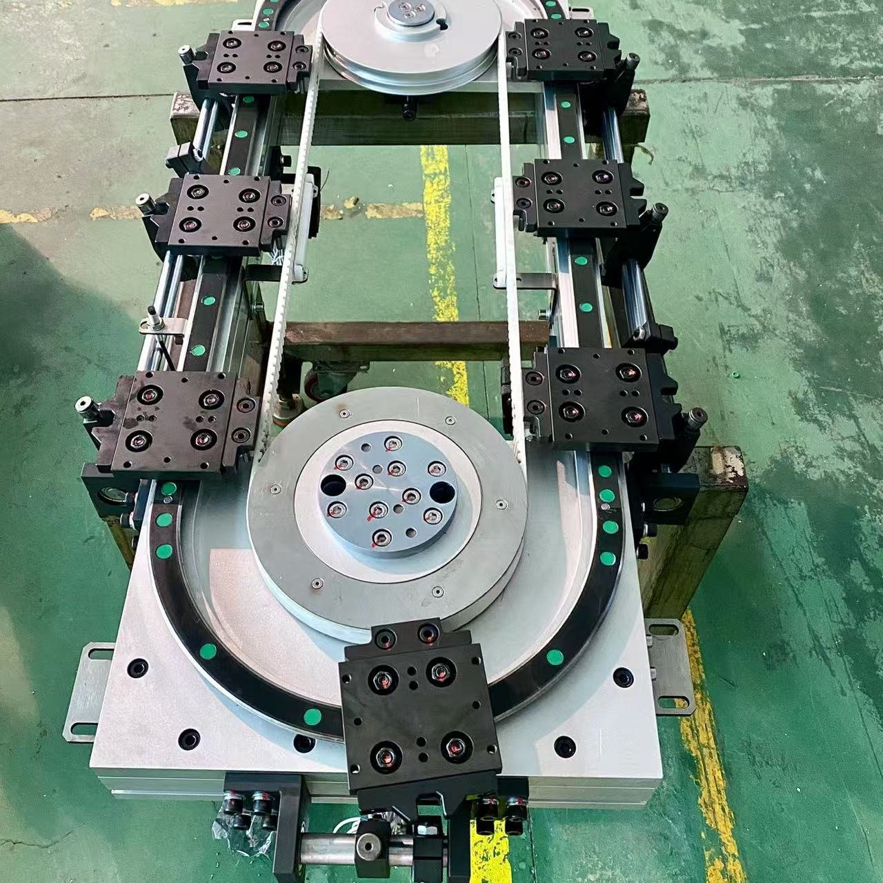 Multi Station Curved Rail And Conveyor For Material Circulation And Distribution In The Automotive Assembly Line