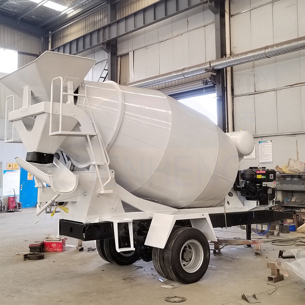 China 9 Cubic Concrete Tow Mixer Truck Drum Mobile Portable Trailer Small Cement Mixing Truck Drum Price with Wheels
