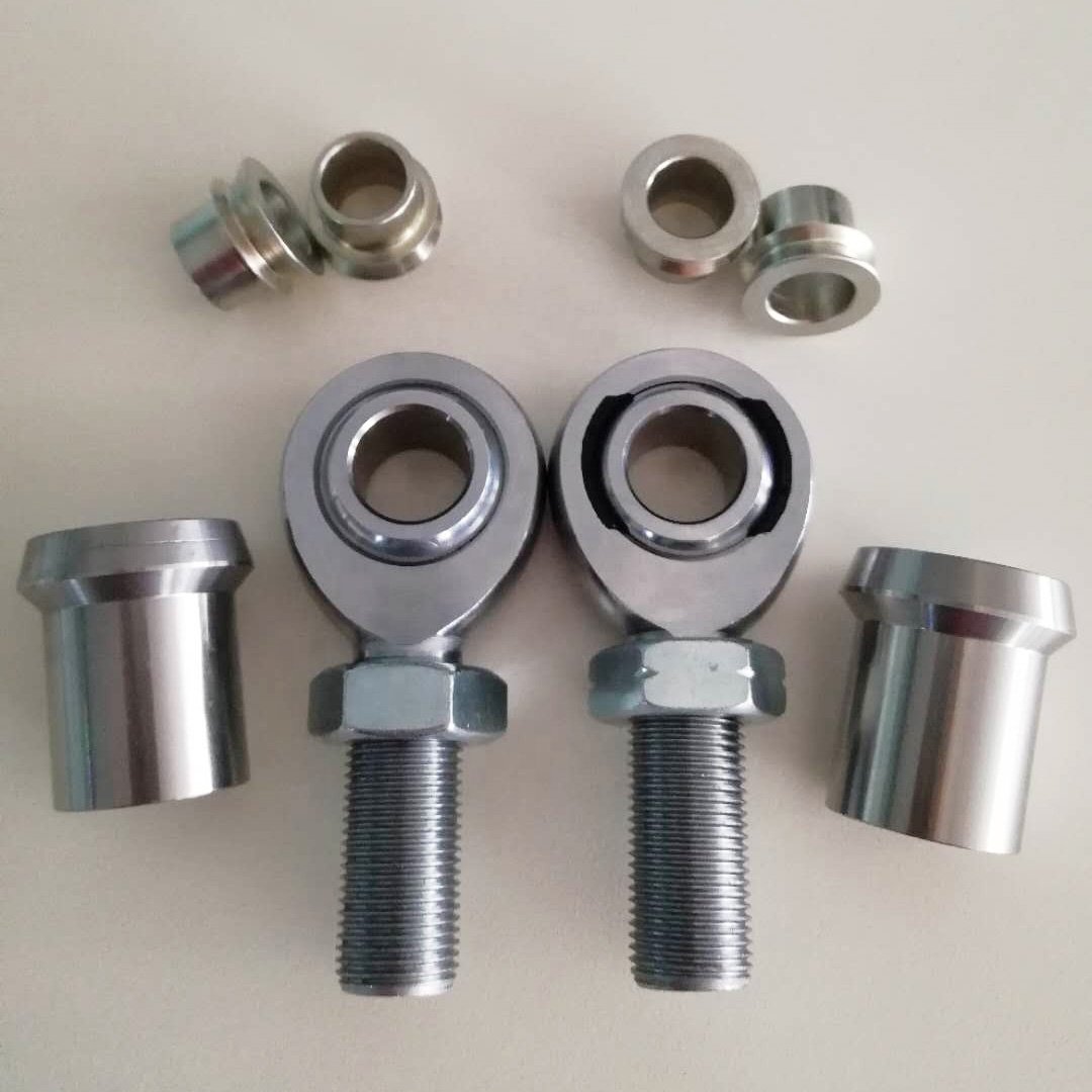Heavy duty suspension parts heim joint with misalignment spacers, welded bung and jam nuts