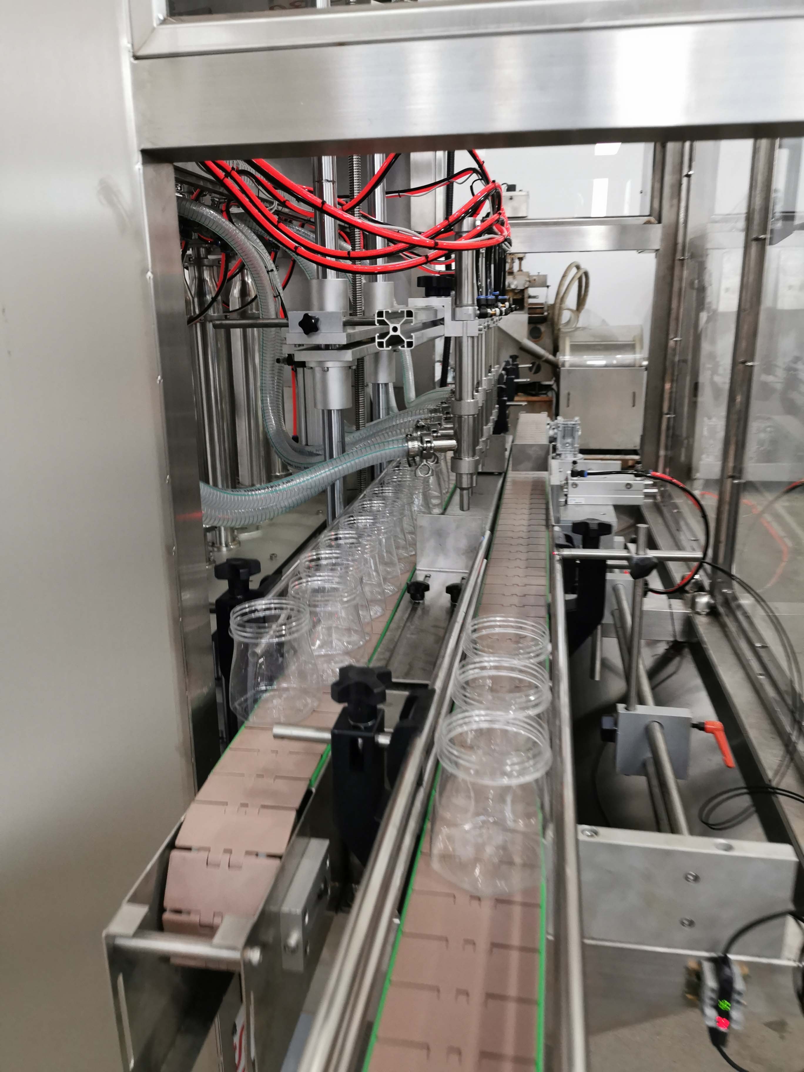 Servo Control Automatic Bottle Filling Machine in Shanghai Auto Liquid Filling Machine