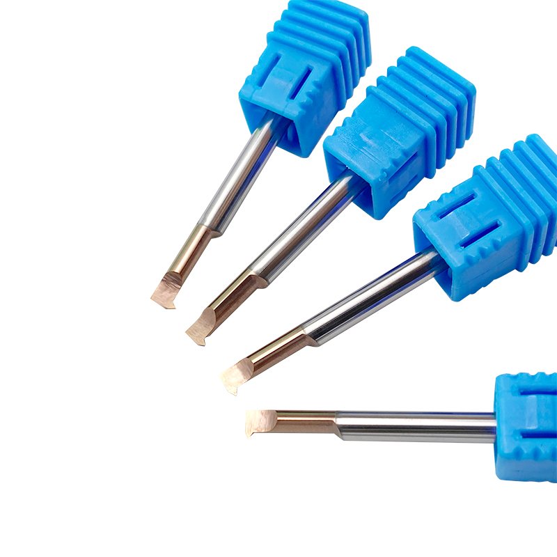 Small tungsten carbide micro groove cutting tool with circular handle and internal hook tool for separating cast iron