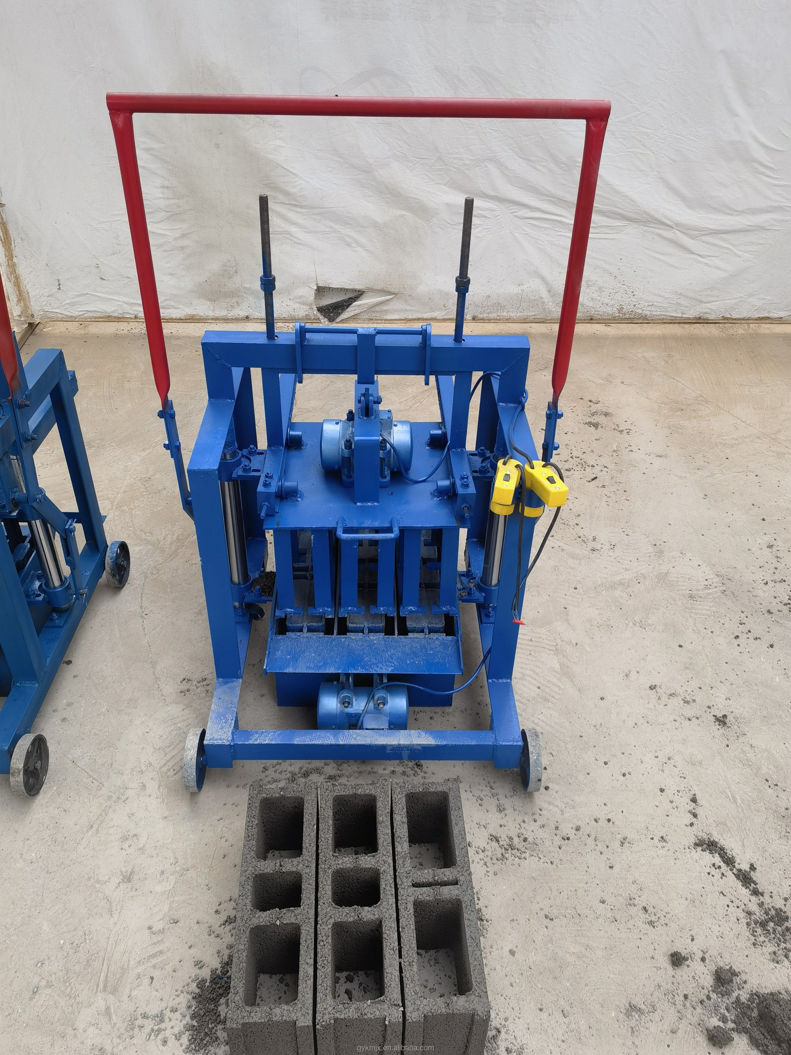 Household Small Brick Making Machine KM2-45 Mobile Concrete Egg Laying Block Brick Machine can be used for building construction
