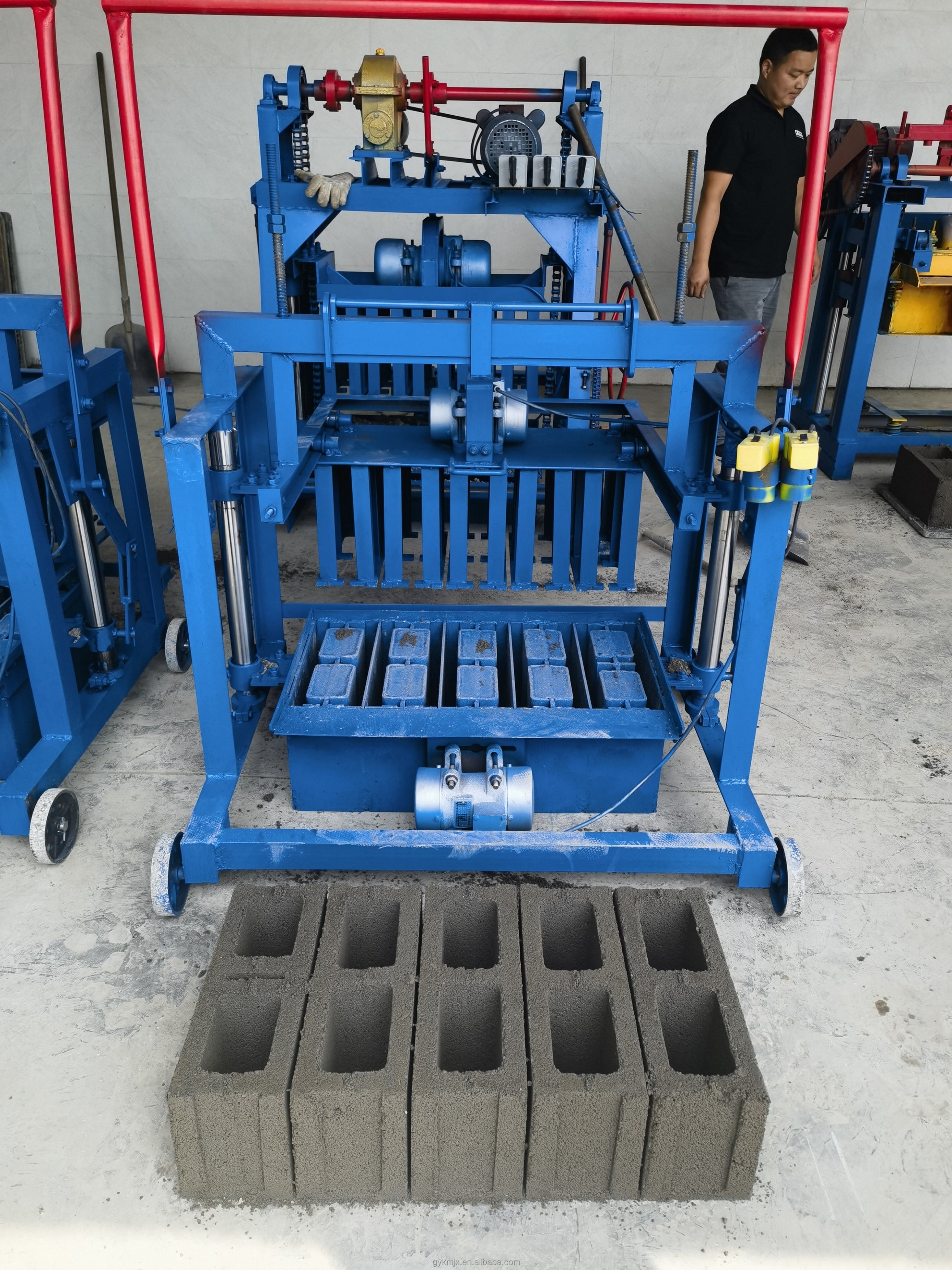 Household Small Brick Making Machine KM2-45 Mobile Concrete Egg Laying Block Brick Machine can be used for building construction