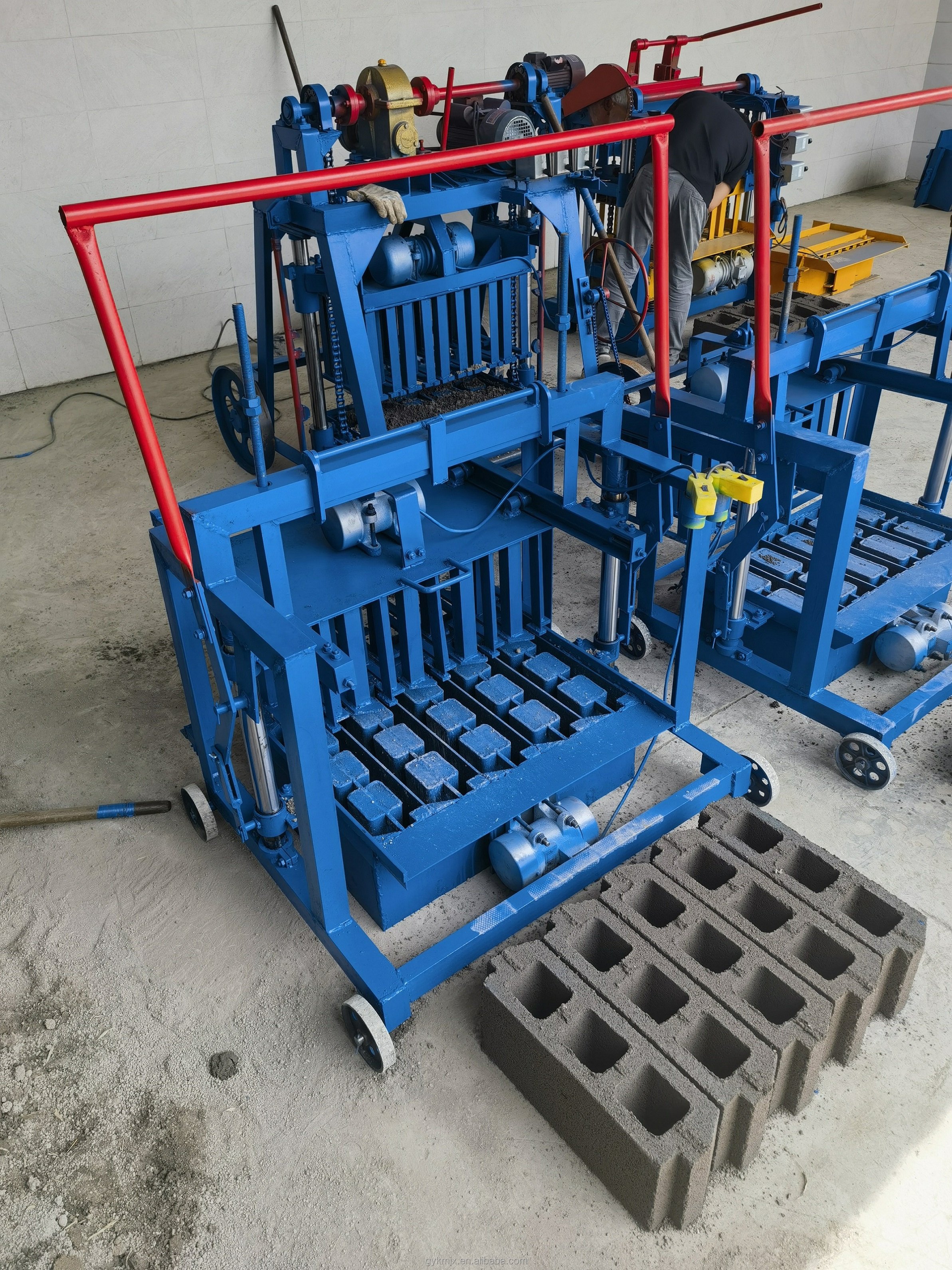 Household Small Brick Making Machine KM2-45 Mobile Concrete Egg Laying Block Brick Machine can be used for building construction