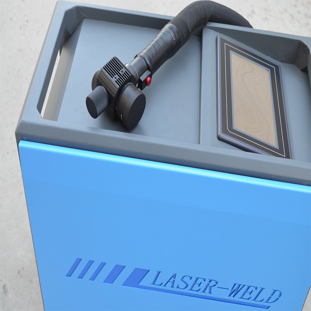 Pulse laser cleaning machine is used to clean rust paint grease and dust on different materials