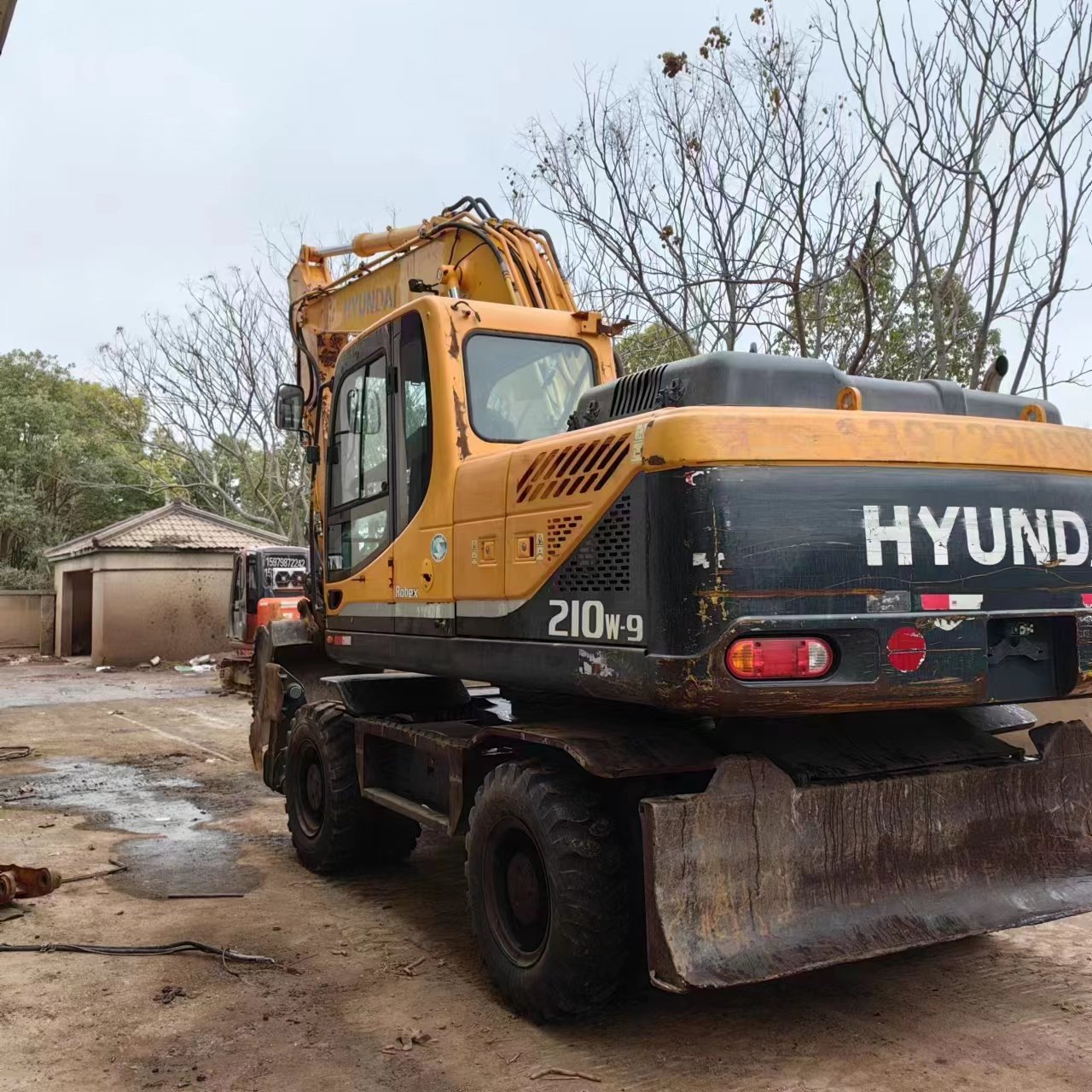 Original Korea Hyundai 210w Wheel Excavator 21Ton R210w-9 R210w-7 Used Excavators