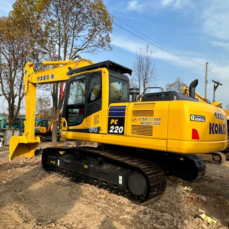 One machine in hand, digging all over the world worry free, Komatsu PC220 excavator.