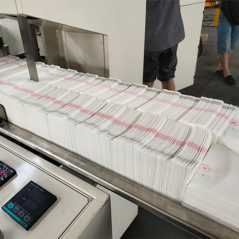 Hot sale full automatic 4 color printing used ladies paper napkin machine prices