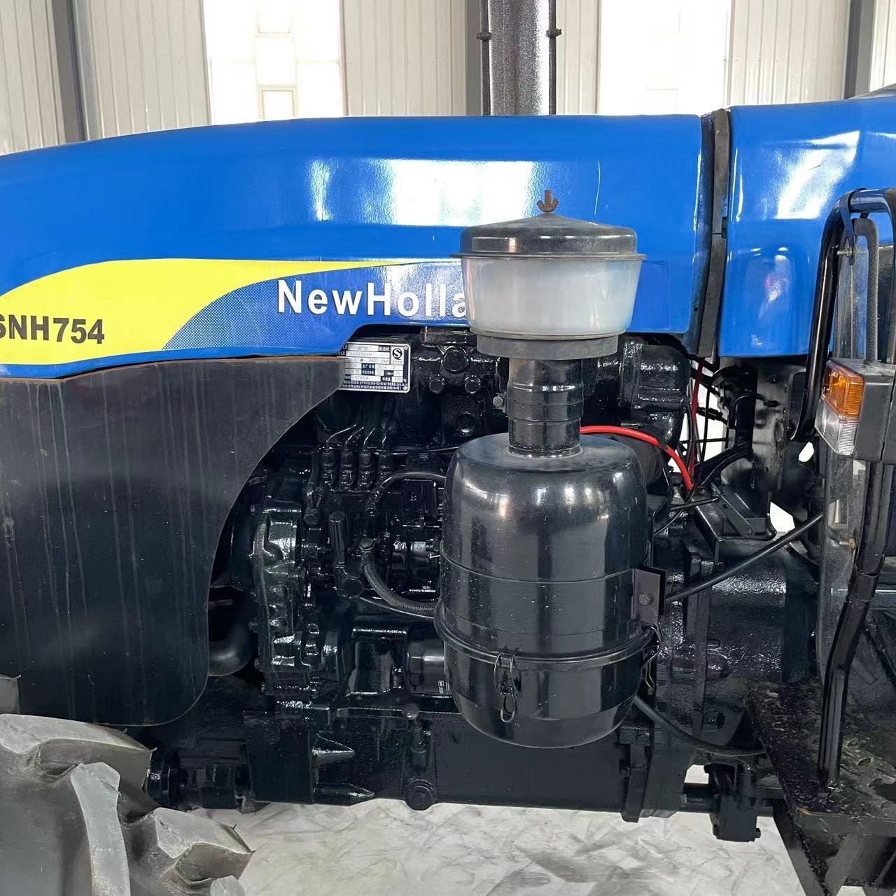 Used/second Hand Farm Wheel Tractors New Holland 4x4wd Agricultural Machinery Front End Loader Td5 Tt75 Low Cheap