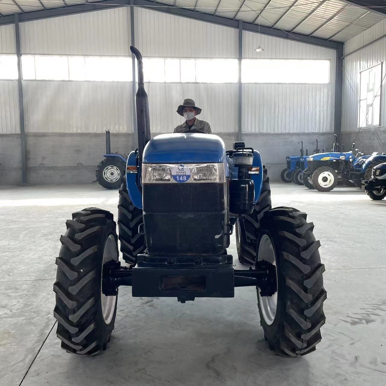 Used/second Hand Farm Wheel Tractors New Holland 4x4wd Agricultural Machinery Front End Loader Td5 Tt75 Low Cheap