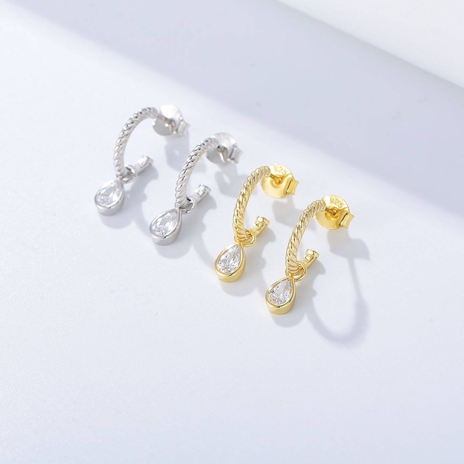 OEM hele jewelry 2022 new design funky 14k gold plated twisted cuff pear cz drop charm fancy earring