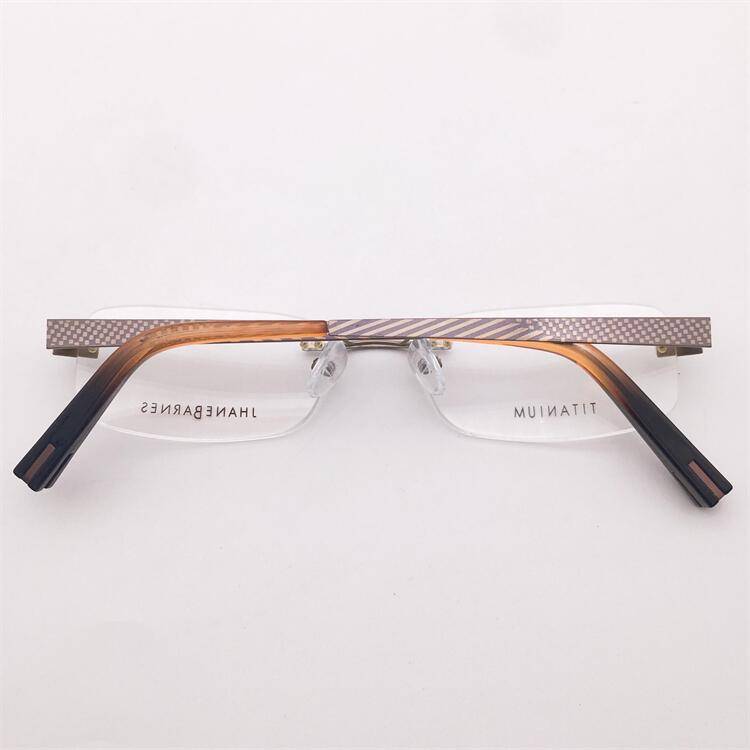 Treasure Lonely Shenzhen Original Single Light Golden Pure Titanium Business temperament Frameless pattern decorative mirror legs glasses rack