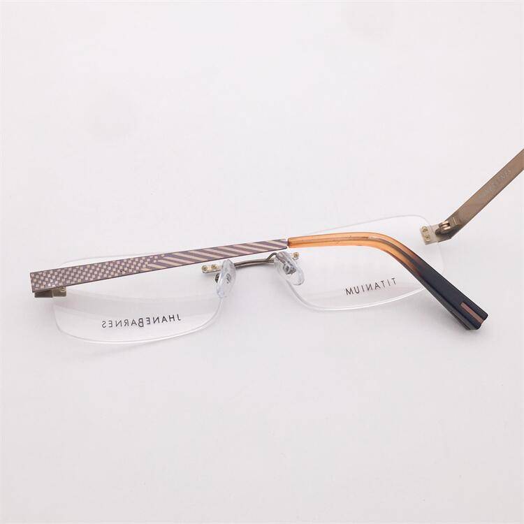 Treasure Lonely Shenzhen Original Single Light Golden Pure Titanium Business temperament Frameless pattern decorative mirror legs glasses rack