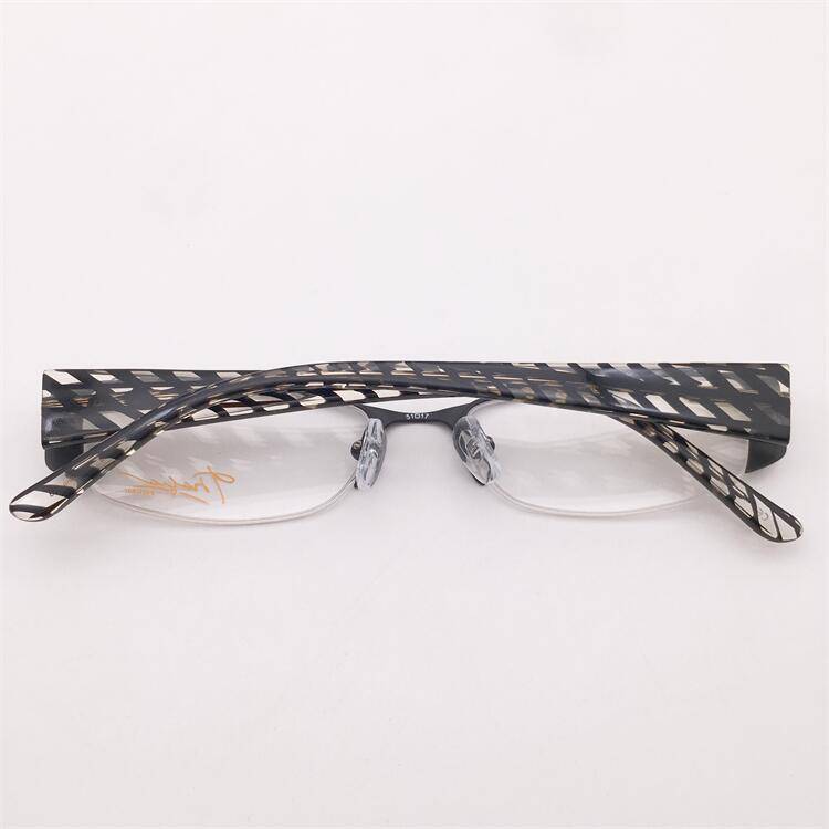 Shenzhen original single black alloy business temperament semi -frame plate plate anti -allergic mirror legs personalized glasses shelf female