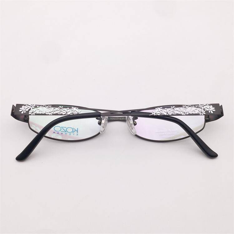 Treasure orphan original single black ultra -light pure titanium full -frame hollow carved model mirror leg temperament glasses shelf female