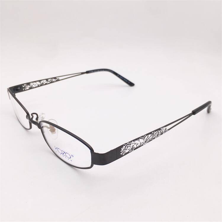 Treasure orphan original single black ultra -light pure titanium full -frame hollow carved model mirror leg temperament glasses shelf female