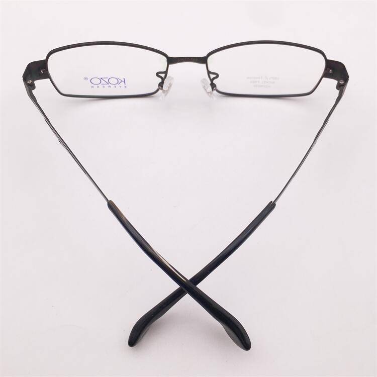 Shenzhen original single black ultra -light pure titanium full frame hollow decorative mirror leg business glasses rack men and women