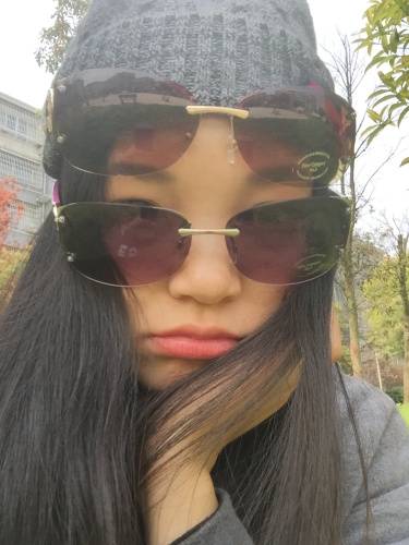 Processing male and female couple neutral metal sunglasses