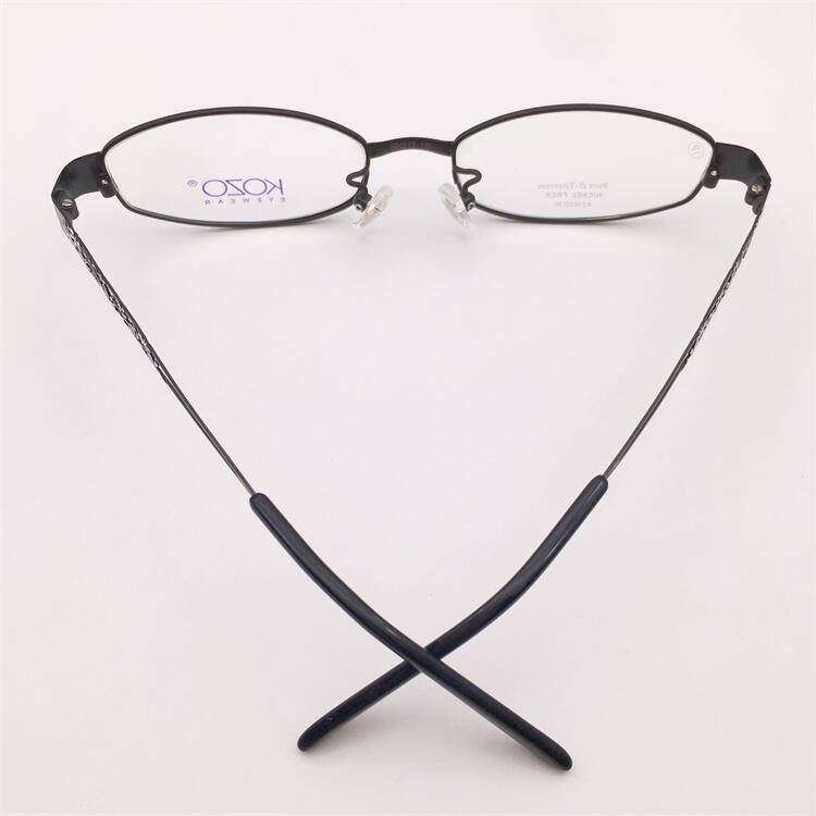 Treasure orphan original single black ultra -light pure titanium full frame small round frame hollow carved mirror leg glasses shelf female