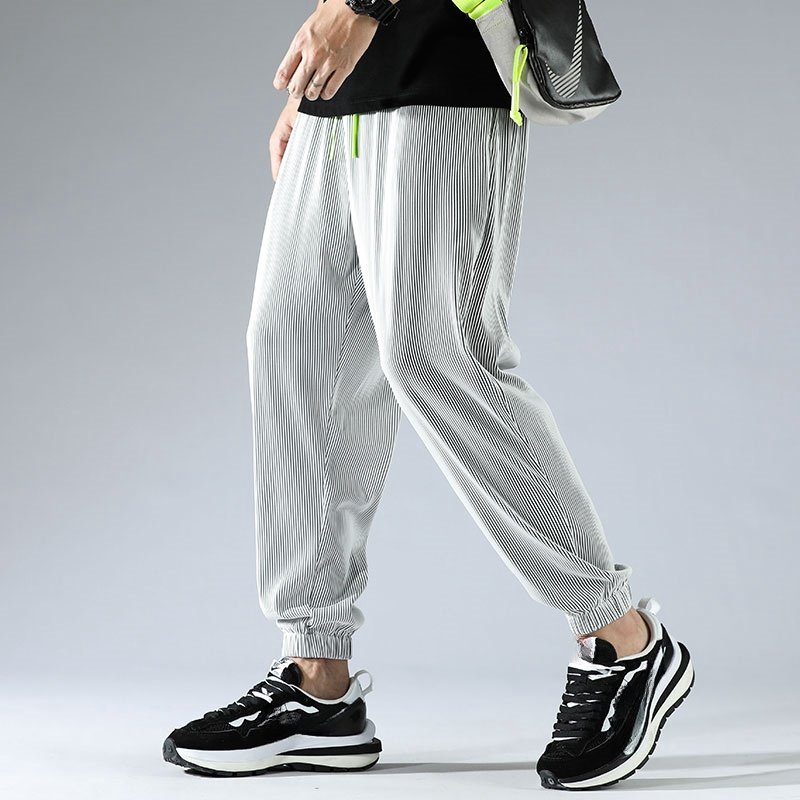 Ice silk casual pants for men with closed cuffs and leg ties, breathable, elastic, loose fit, sports pants, trendy brand