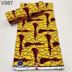 V987