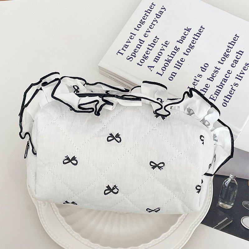 New Arrival Puffer Travel Cosmetic Bag Bow Tie Pattern Quilted Cotton Padded Case Luxury Blue Perfume Cosmetic Bag With Bow-Knot