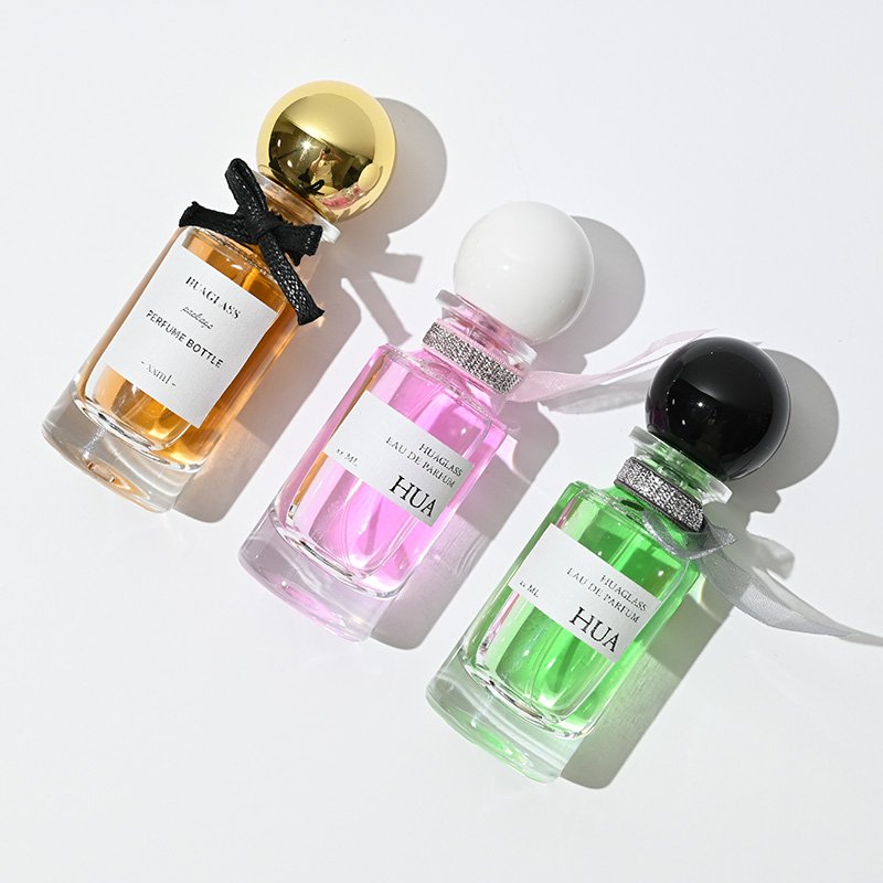 Fashion rounded tie perfume bottle clear 30ml 100ml perfume bottle luxury glass 30ml 100ml with ball cap