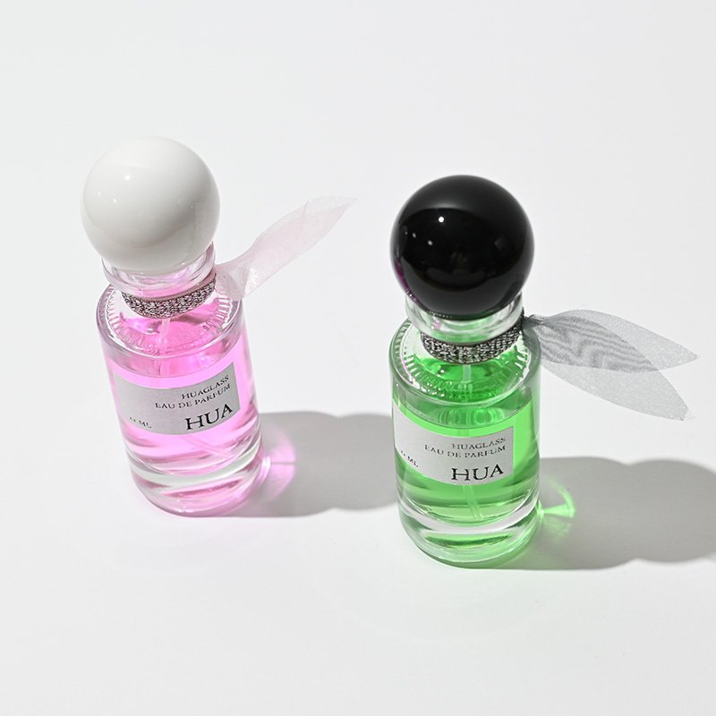 Fashion rounded tie perfume bottle clear 30ml 100ml perfume bottle luxury glass 30ml 100ml with ball cap