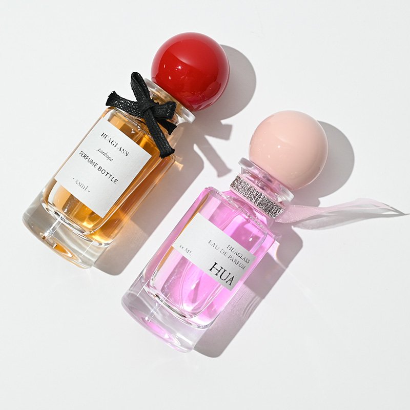 Fashion rounded tie perfume bottle clear 30ml 100ml perfume bottle luxury glass 30ml 100ml with ball cap