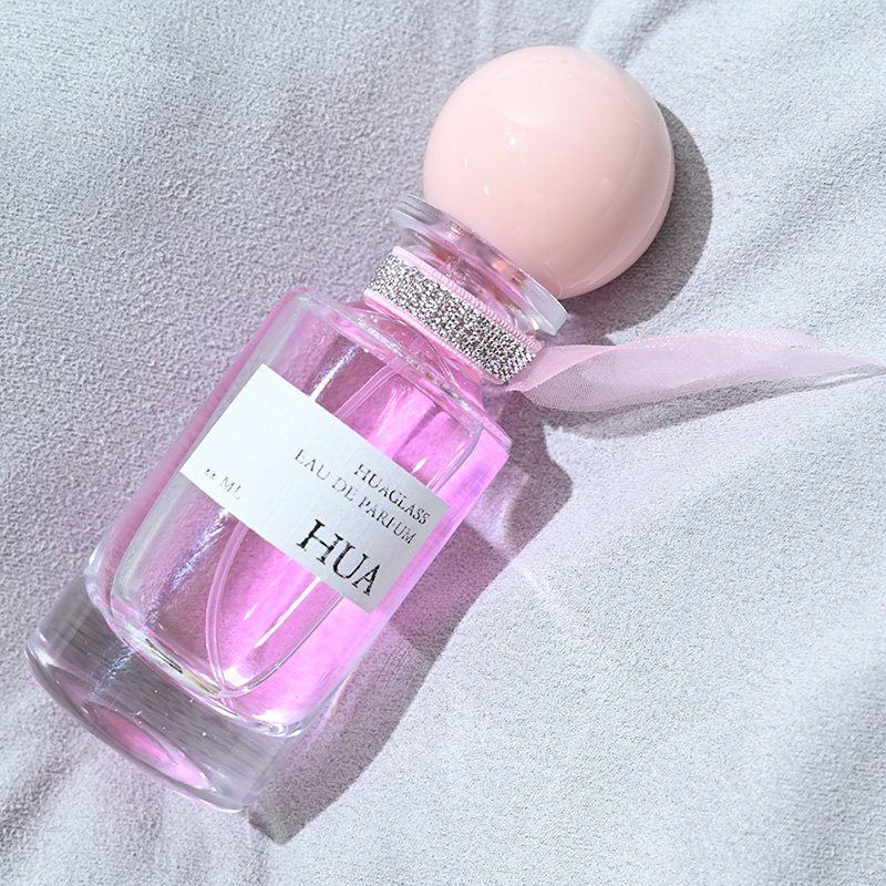 Fashion rounded tie perfume bottle clear 30ml 100ml perfume bottle luxury glass 30ml 100ml with ball cap
