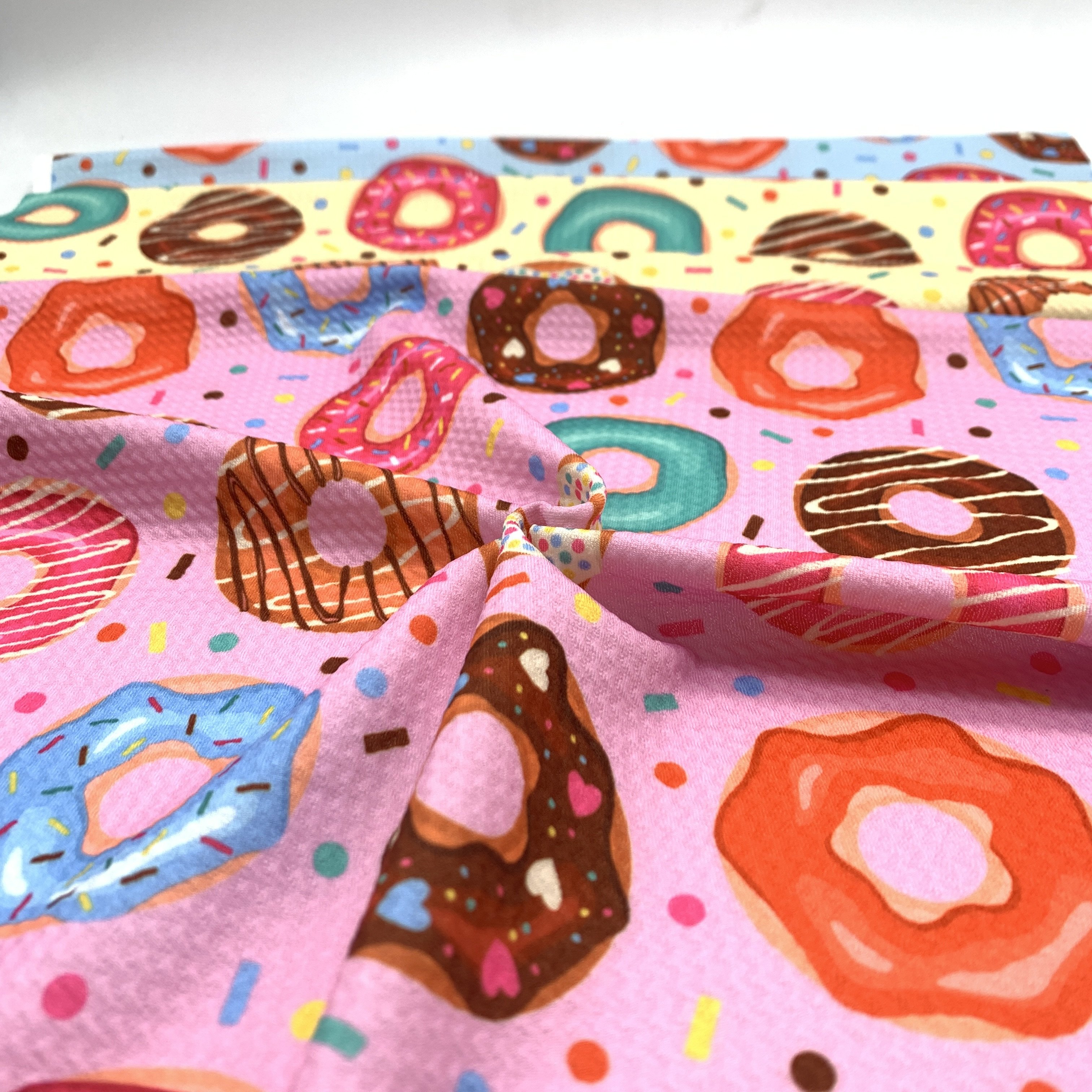 Liverpool Bullet Poly Spandex Stretch Printed donut graphic 4 Way Stretch bullet fabric