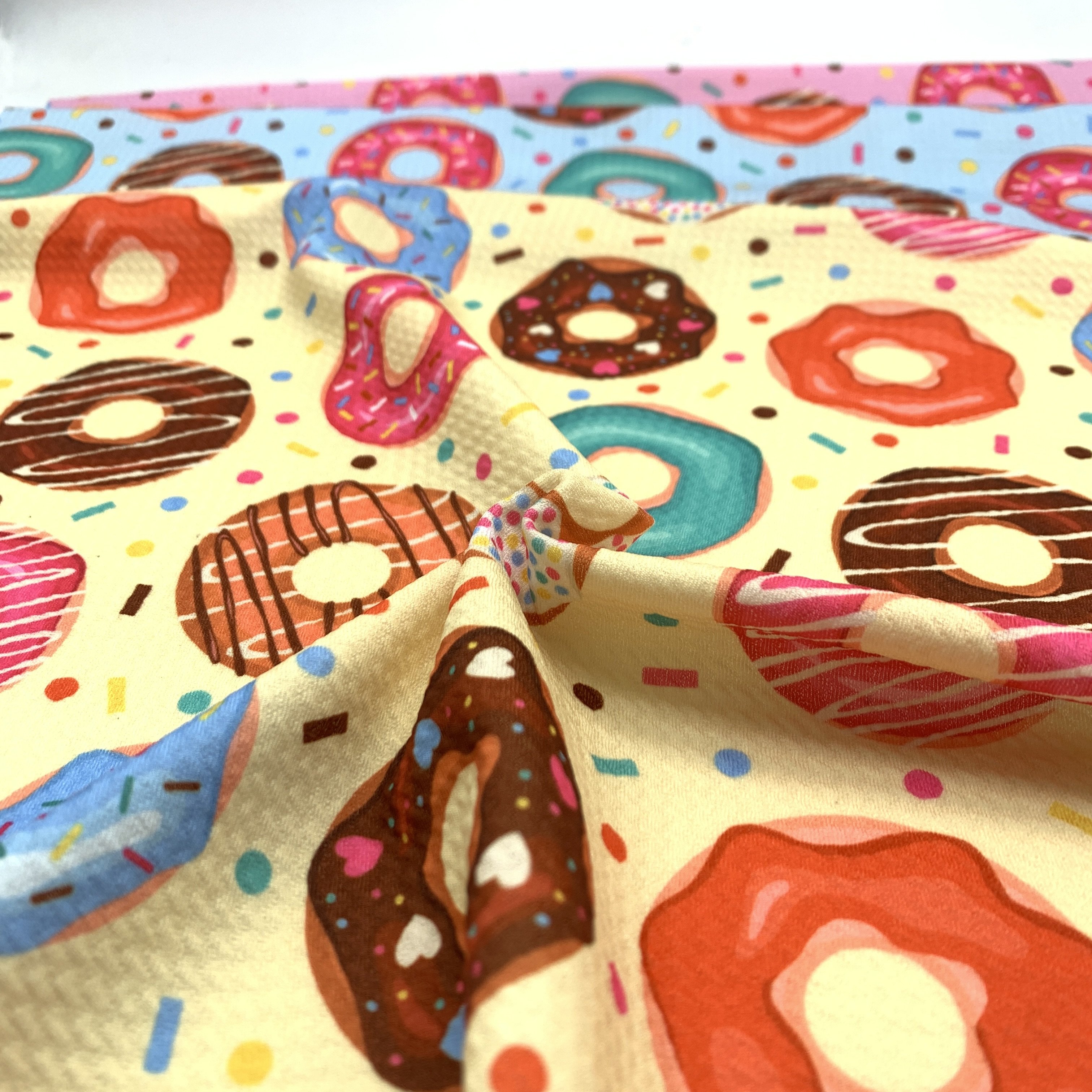 Liverpool Bullet Poly Spandex Stretch Printed donut graphic 4 Way Stretch bullet fabric