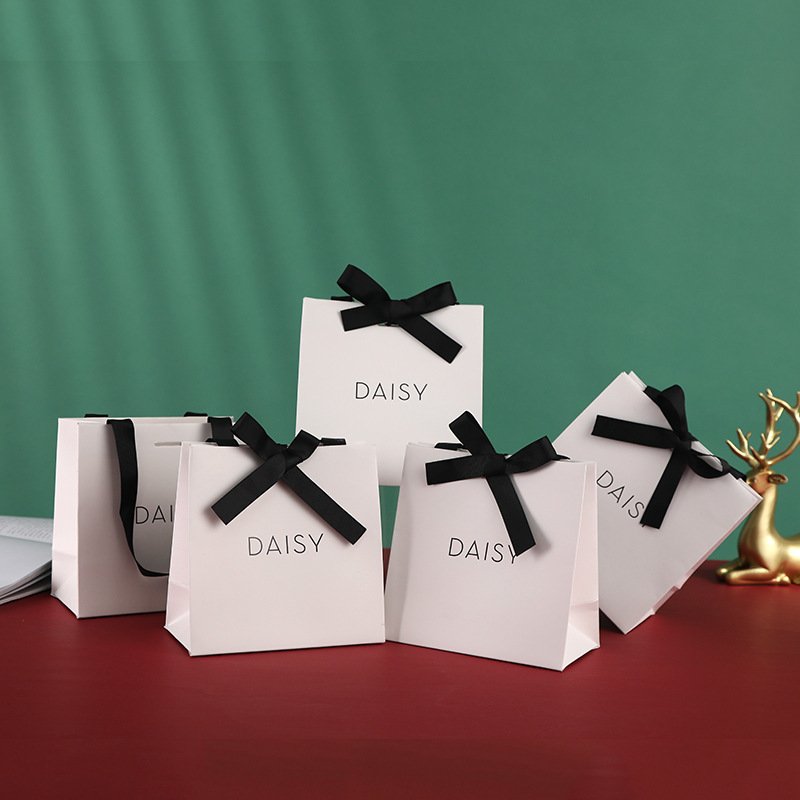 Custom Printed Fancy Logo Black Bow Tie White Cardboard Luxury Gift Jewelry Paper Shopping Bag With Ribbon Handle