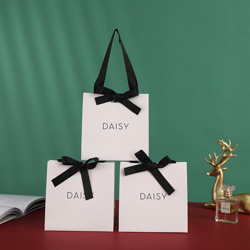 Custom Printed Fancy Logo Black Bow Tie White Cardboard Luxury Gift Jewelry Paper Shopping Bag With Ribbon Handle