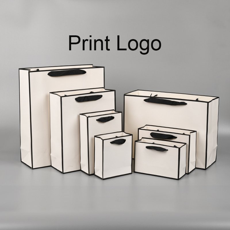 KM customized boutique jewellery golden supplier recycled gift paper bags wholesale with ribbon handle