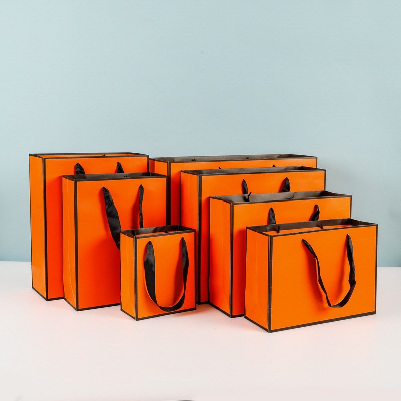 KM customized boutique jewellery golden supplier recycled gift paper bags wholesale with ribbon handle