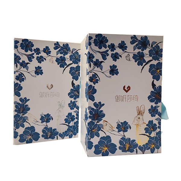 Custom luxury cosmetics rigid boxes with foil stamping logo skincare sets ribbon tie makeup sets rigid boxes