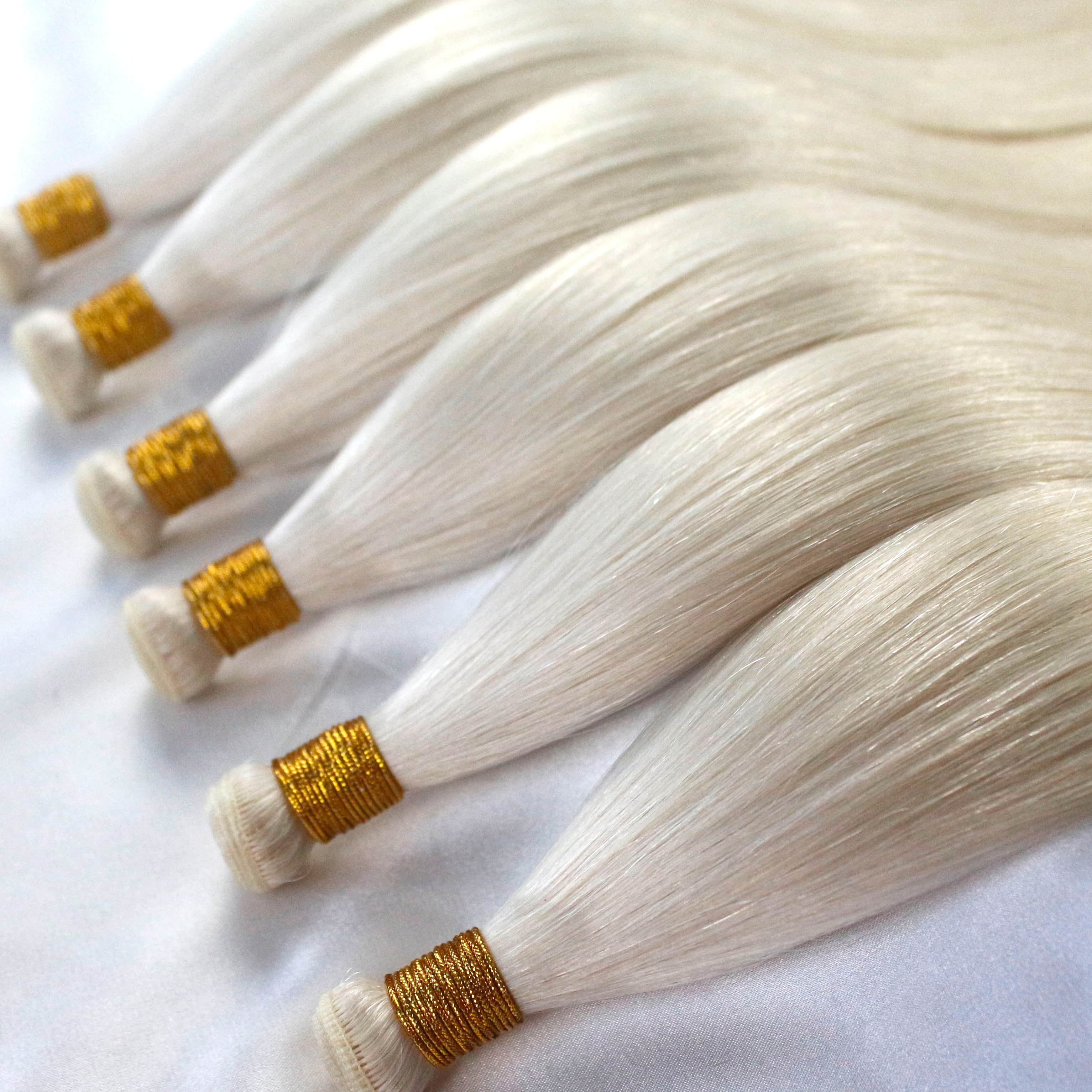 Wholesale Factory Full Cuticle Long Lasting Invisible New Thin Soft Hand Tied Weft Hair Extensions
