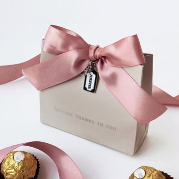 Eco-friendly Luxury Custom Printed Logo creative custom bow shopping bag cosmetics Jewelry clothing paper bags with bow