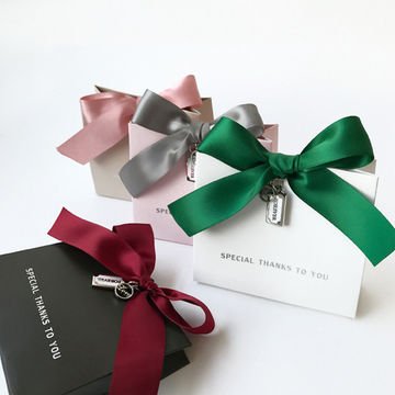 Eco-friendly Luxury Custom Printed Logo creative custom bow shopping bag cosmetics Jewelry clothing paper bags with bow