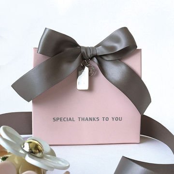 Eco-friendly Luxury Custom Printed Logo creative custom bow shopping bag cosmetics Jewelry clothing paper bags with bow