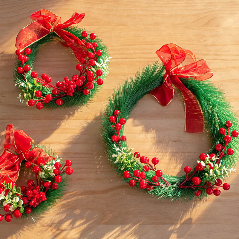 The front door is tied with a bow pine needle Christmas Garland Christmas decoration garland or Vine as Christmas