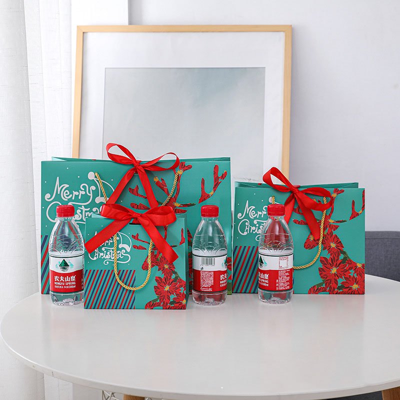 High Quality Customized Factory Recycled Doypack Christmas Gift Packaging Elk Santa Pattern Paper Bag With Bow Tie Ribbon Handle