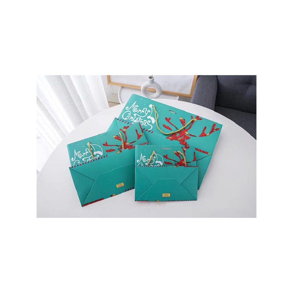 High Quality Customized Factory Recycled Doypack Christmas Gift Packaging Elk Santa Pattern Paper Bag With Bow Tie Ribbon Handle