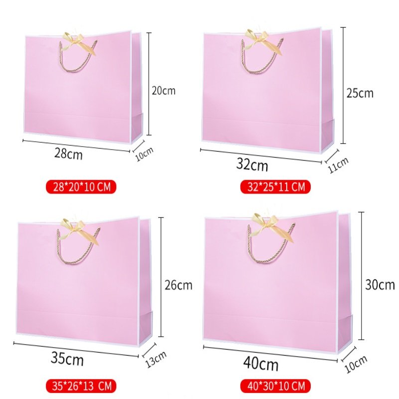 Standing gift bag pink with bow tie shopping paper bag can be customized LOGO wholesale white card paper bag with handles
