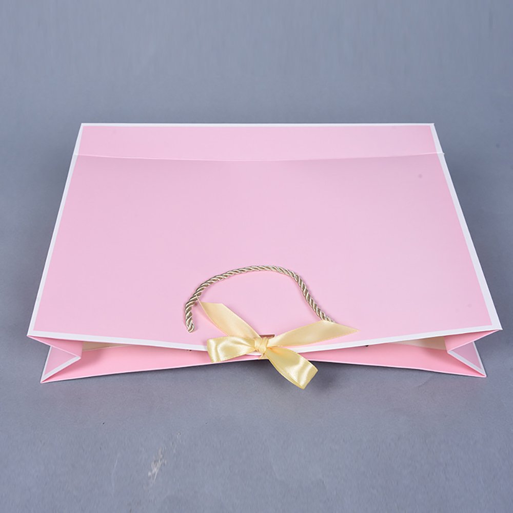 Standing gift bag pink with bow tie shopping paper bag can be customized LOGO wholesale white card paper bag with handles