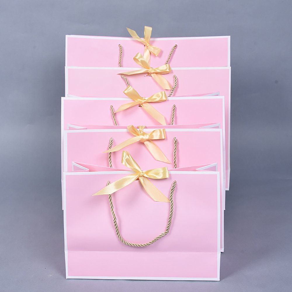 Standing gift bag pink with bow tie shopping paper bag can be customized LOGO wholesale white card paper bag with handles