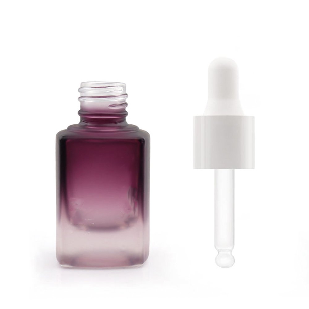 Personalized glass dropper bottle with aluminum collar for cosmetic applications
